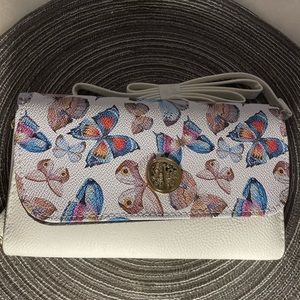 Butterfly purse with string, great condition, ready to wear no flaws never worn